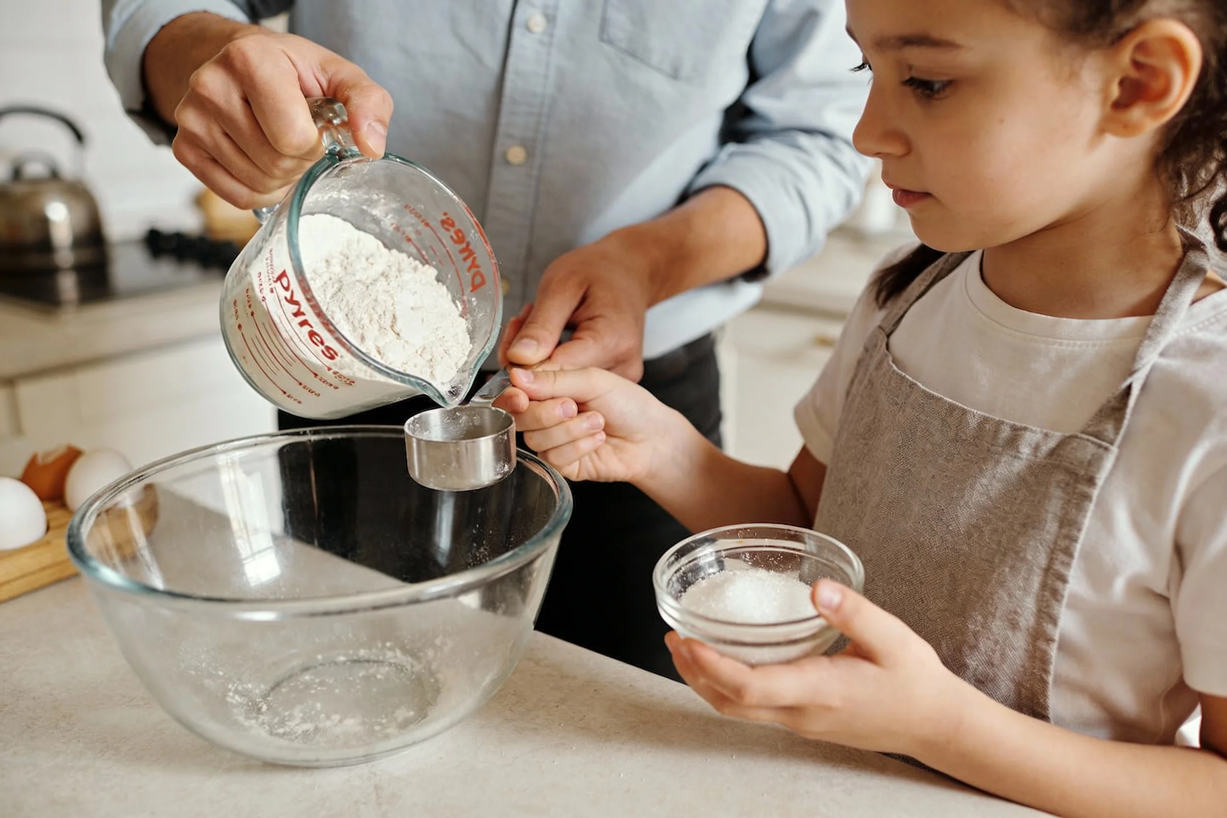 Parent and child measuring ingredients